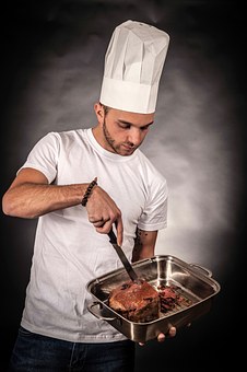 chef preparing meat