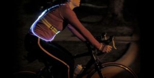 wearing led vest while on bicycle 