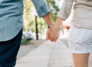 couple holding hands